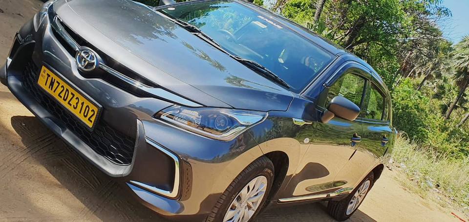 Our grey Toyota Glanza, front view