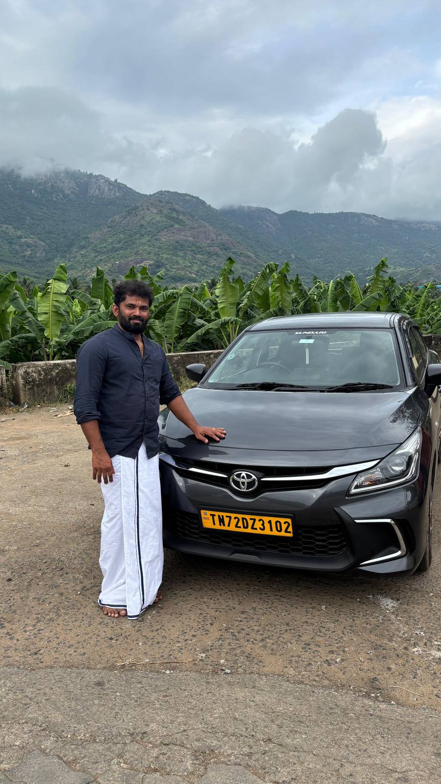 The owner of First Fleet Cab Service standing beside the Glanza