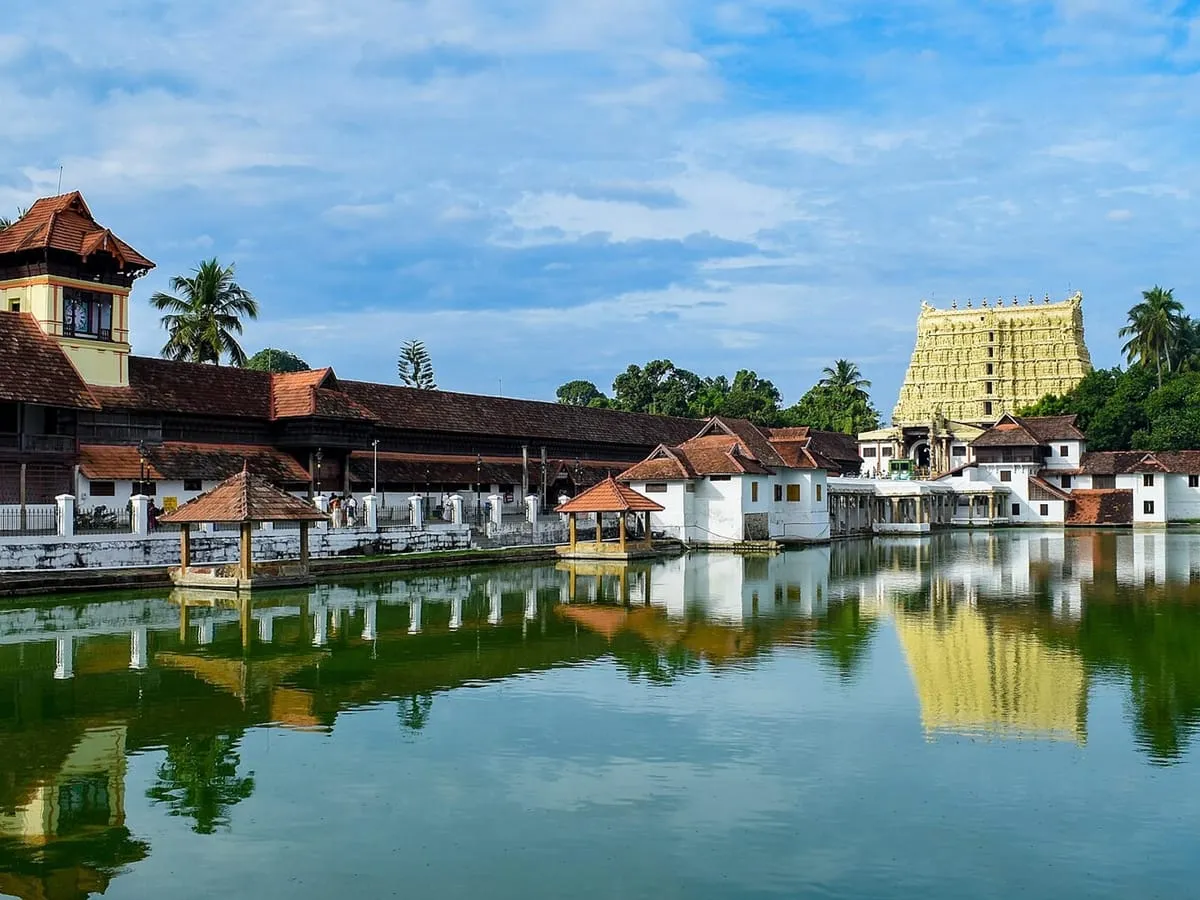 The gopuram of the Sree Padmanabhaswamy Temple reflected in the temple tank, Thiruvananthapuram